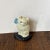 Charming white cat with blue ribbon iron doorstop. Made in Maine. Newly painted. Signed.