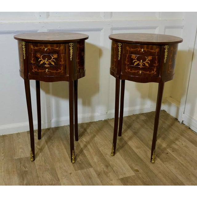A Pair of French Oval Side Tables or Bedside Cabinets This is a superb quality pair of French side tables, they each have...