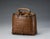 This small elegant woven bamboo basket was meant to be a hand-hold bag with its brocade interior (which appears original)....