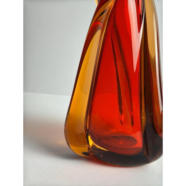 A bold and sculptural example of mid-century Italian glass, this Murano vase dates to the 1960s and is executed in the...