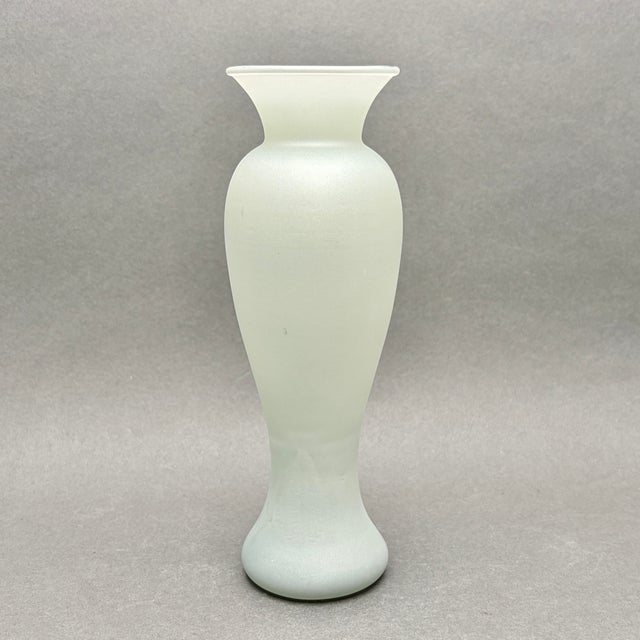 • Vintage mid-century modern art glass vase with an elegant elongated form and flared rim. • Maker and country of...
