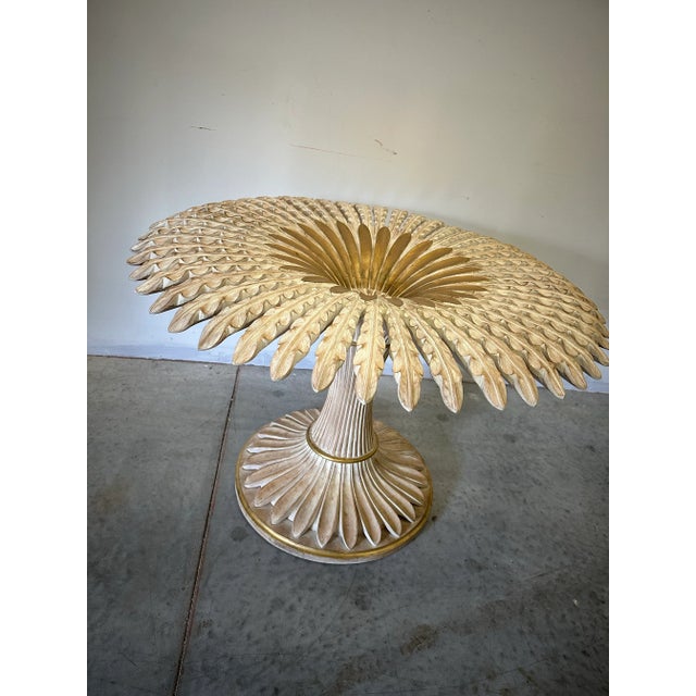 Gorgeous Hollywood Regency dining table. A total conversation piece. Stunning Palm base pedestal in a finely carved wood...