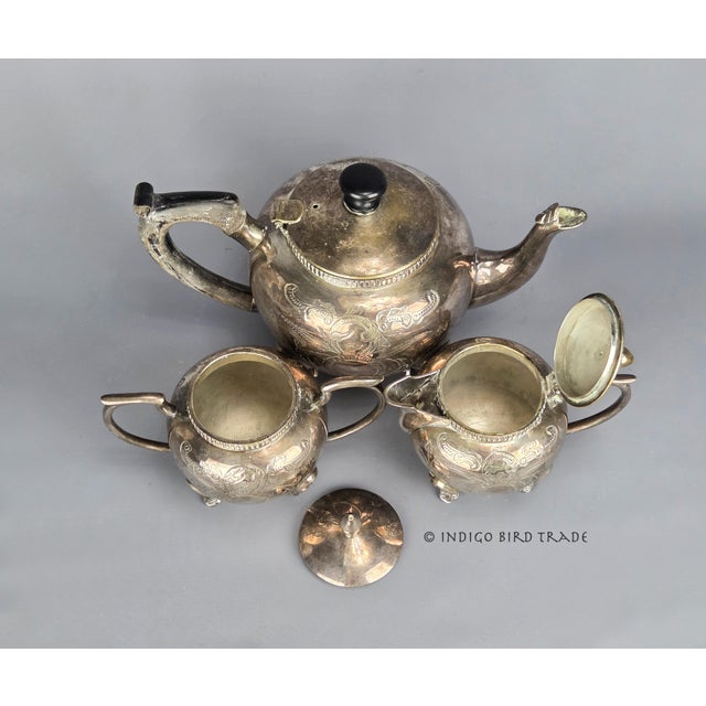 Antique Victorian Silver Plated Tea Set of 3 These beautifully engraved tea/coffee pot, creamer, and sugar bowl are made...