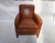 Leather Poete Armchair by McNamara & Hirschman The chair is beautifully upholstered in a rich Chestnut-colored leather...