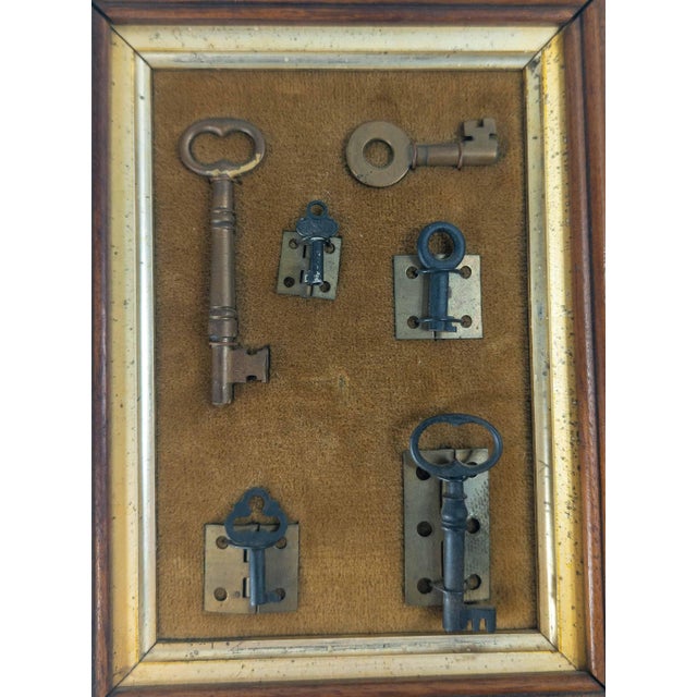 We are selling this cool assemblage of antique and vintage keys and hinges. The keys vary in size and age, with weird...