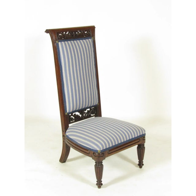 A fine period 18th-C. French Louis XVI Cuban mahogany slipper chair with new Stroheim striped fabric and custom trim....