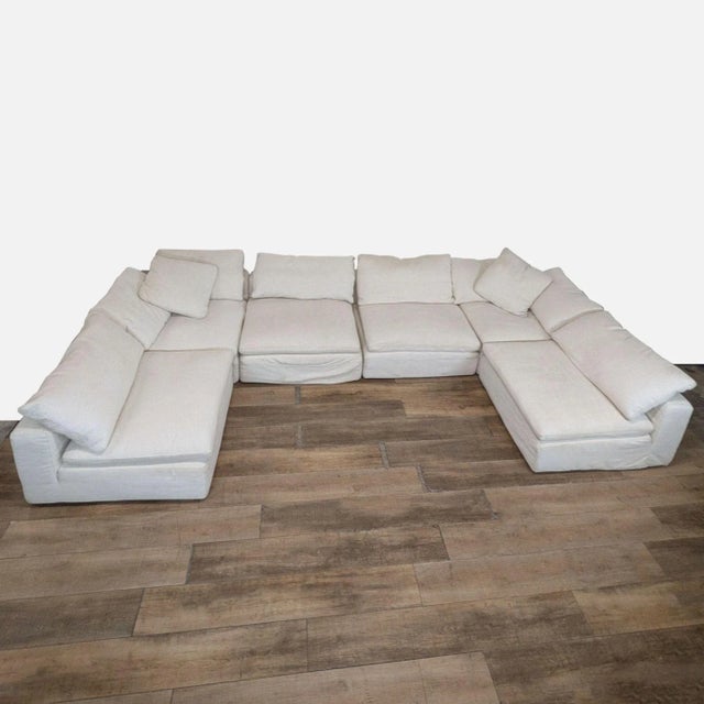 This sectional is constructed with soft feather and down around a premium foam core, providing a "sink-in" comfort often...