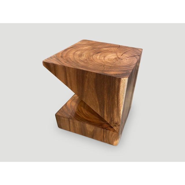 Solid reclaimed suar wood side table with a natural oil finish revealing the beautiful wood grain. Inspired by the art of...