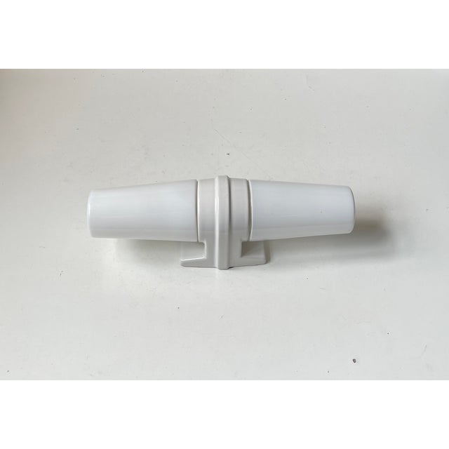 A dual Wall lamp suitable as bathroom or outdoor lighting. Designed by Prince Sigvard Bernadotte for the swedish company...