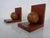 Two teak bookends from the 1960s.
