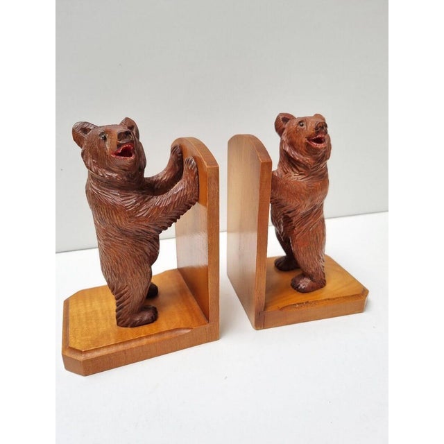 A pair of antique, very charming bookends with hand carved bears from the black forest. beautifully detailed hand-carved...