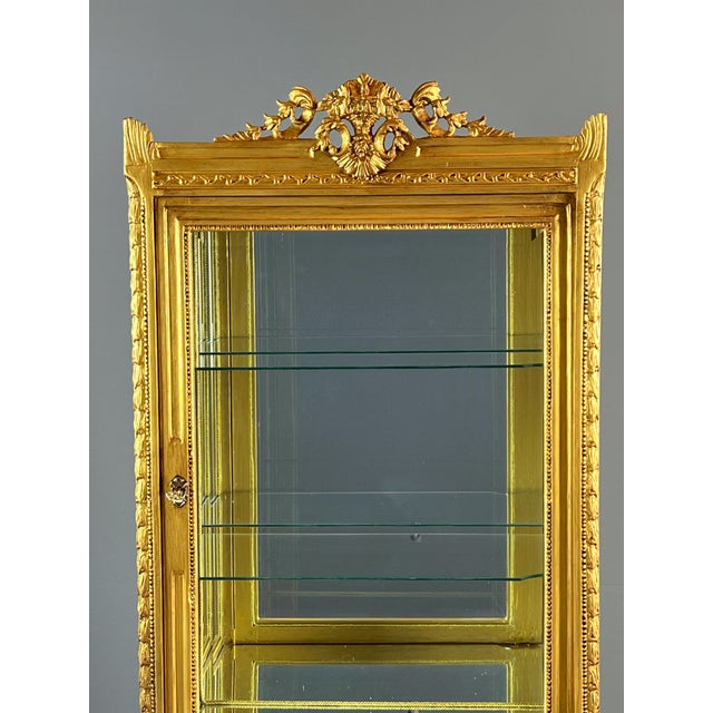 Louis XVI Style Carved and Gilded Wooden Display Case, 20th Century, in Flawless conditions. Designed 1890 to 1919
