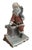 A Lladro classic from 2007, "Down the Chimney". A whimsical portrayal of Santa with his full pack of toys about to head...