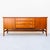 A newly refinished sapele mahogany buffet / sideboard with brass pulls attributed to D.S. Vorster & Co., made in South...