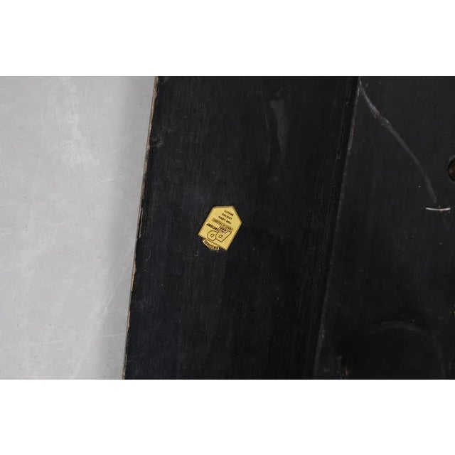 Elevate your living space with the timeless elegance of the Bovenkamp Coffee Table, designed circa 1950. This exceptional...