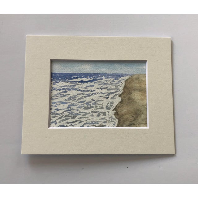 In this seascape, I focused on how the lacy waves played against the shore and the division between land and sea....