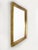 20th-century French wall mirror with a molded wooden frame entirely gilded with gold leaf. The gilding has a superb...