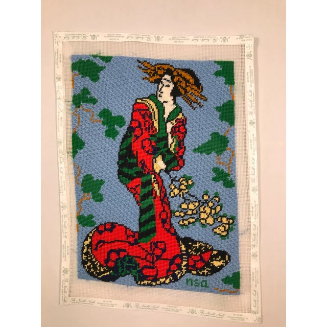 Hand-stitched needlepoint Asian Ladies. 100% wool yarn. One is looking up and the other is looking down. Can be framed or...