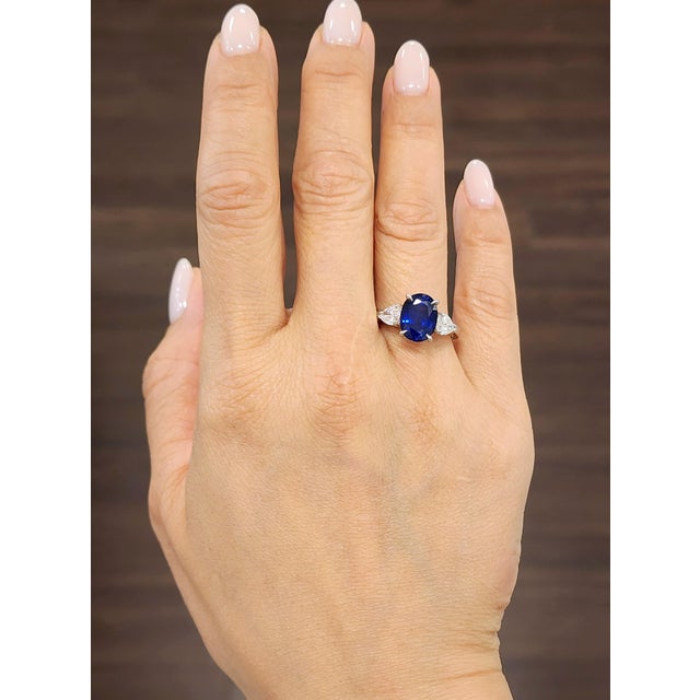 Introducing a masterpiece of design and craftsmanship—this extraordinary ring showcases a magnificent oval-shaped natural...