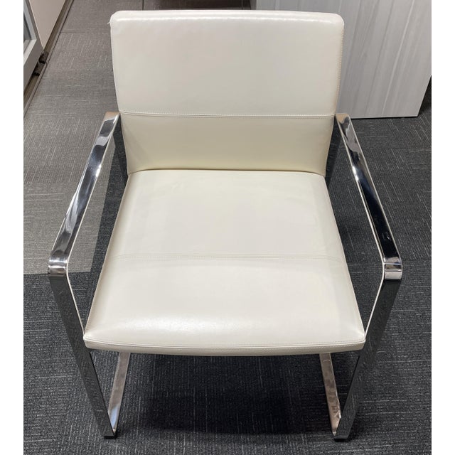 The Celon chair presents the perfect balance of an exposed metal frame with streamlined upholstery, offering an upscale...