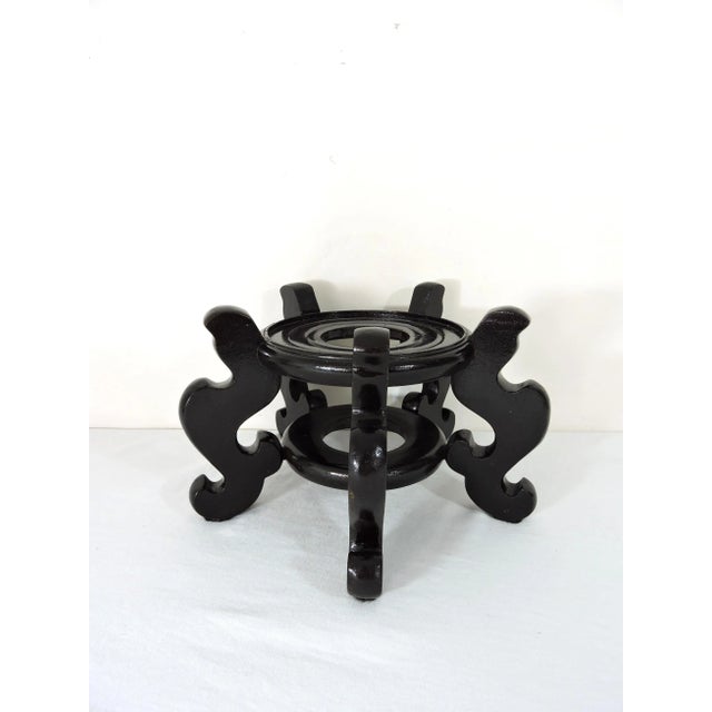Vintage Chinese hard wood stand, with five hand carved shaped legs with lower stretcher and turned round top. Will fit...