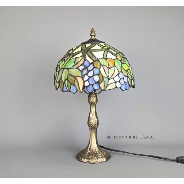 Vintage Stained Glass Tiffany Style Accent Lamp This lovely accent lamp features an abundance of grape clusters nestled...