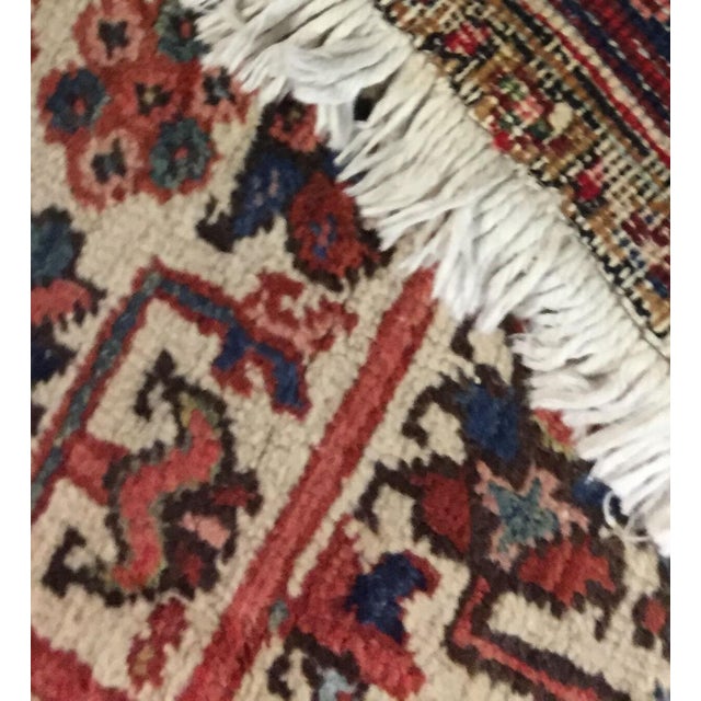 Vintage handwoven wool Persian heriz rug with a traditional design. Color: ivory, blue, red