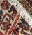 Vintage handwoven wool Persian heriz rug with a traditional design. Color: ivory, blue, red