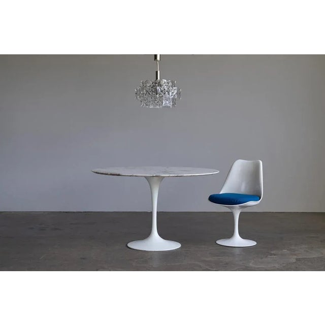 Chrome plated steel and crystal glass chandelier manufactured by Kinkeldey. with its 12 E14 sockets, it provides enough...