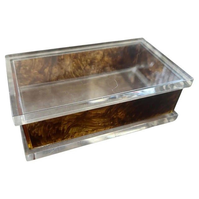 A glamorous 1970s vanity or utility box, crafted from a striking combination of clear and faux tortoiseshell...