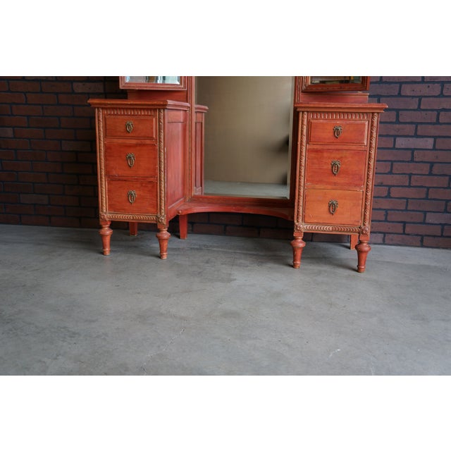 Antique French Regency style vanity with standing mirror. Finely crafted by the Northern Furniture Company of Sheboygan,...