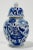 Vintage petite lidded blue and white floral motif temple jar. Marked Formalities by Baum Brothers. Age wear. No chips or...