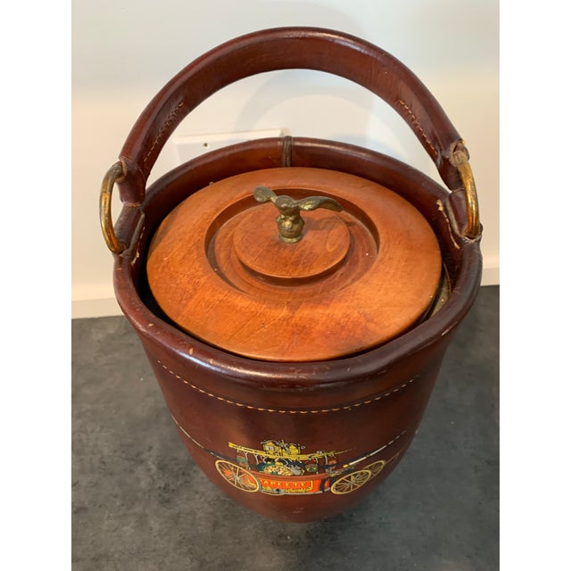 Vintage Loyal Papeete fire truck brown Leather Wrapped Ice Bucket, Mid-20th Century With horse drawn carriage design...