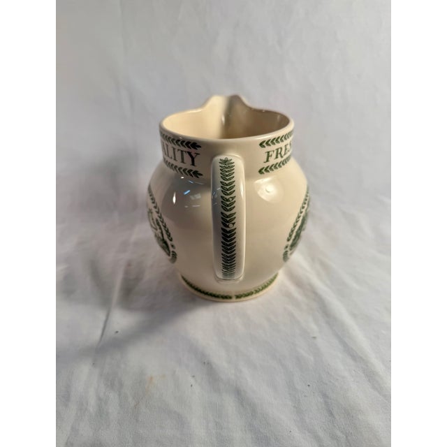 This charming milk jug is evocative of English country living and traditional British pottery. Emma Bridgewater Company is...