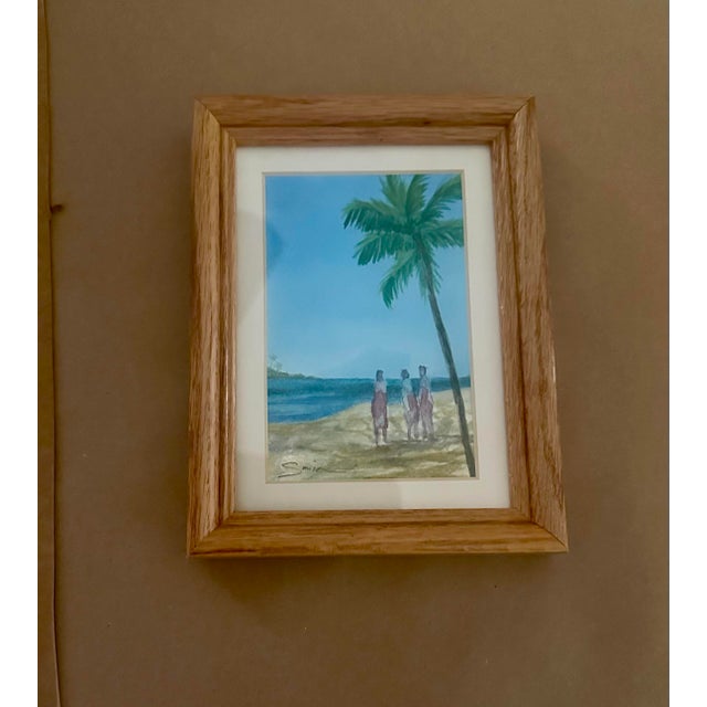 A delightful original watercolor depicting a peaceful tropical beach beneath a graceful, arching palm tree. Three figures...