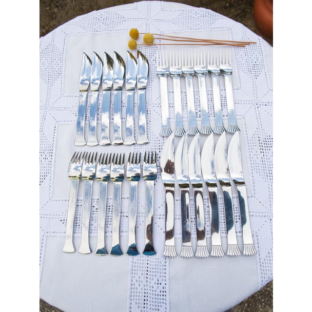 Measurements and weights: 18 and 21.5 cm (63, 81 grams). They may be brand new, but the handles of some pieces, due to the...