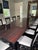 Art Deco dining table and 12 chairs. Table is 130 inches long, 47 wide and 30 inches high. Chair are a soft white leather,...