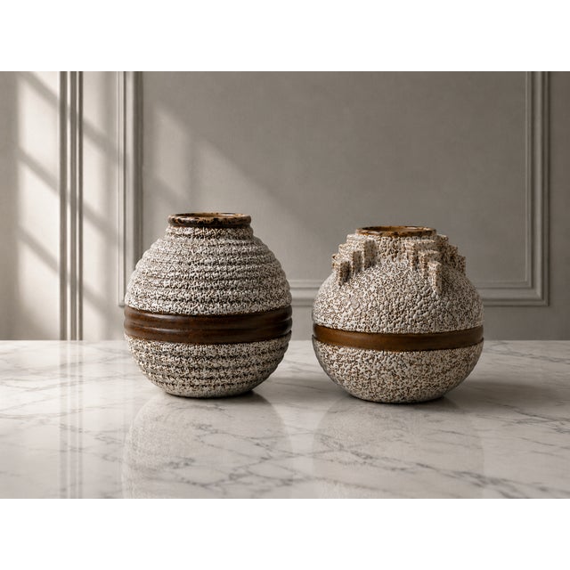 A rare companion pair of authentic french art deco ceramic vases produced by the odyv berlot-mussier manufactory in...