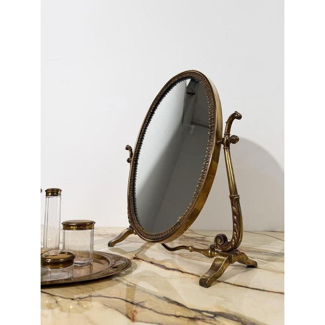 Charming italian cast brass vanity mirror, made in italy around the mid-20th century, circa the 1950s. we can easily...