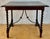 A handsome Spanish side table crafted from solid wood during the 1920s, showcasing the timeless appeal of traditional...