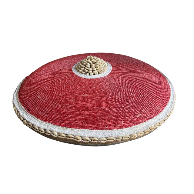 Superb African tribal round shield, meticulously hand made from native hardwood and adorned with intricate beadwork using...