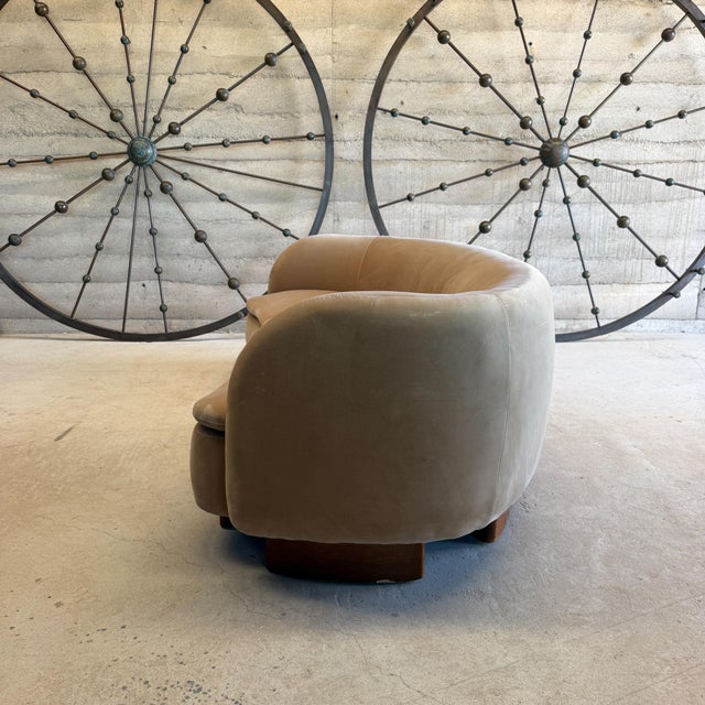 For your consideration, CB2 Muir Curved Sofa by Lawson-Fenning upholstered in a soft camel velvet with a distinctive...