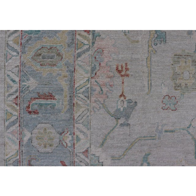 Textile Large Modern Oushak With Floral Design on Light Blue Border With Pop of Colors For Sale - Image 7 of 13