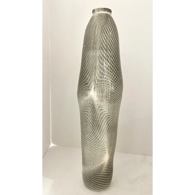 A stunning pair of stoneware vessels by the noted artist Lauren Gelgor Kaplan. Retailed by Takashimaya in New York City....