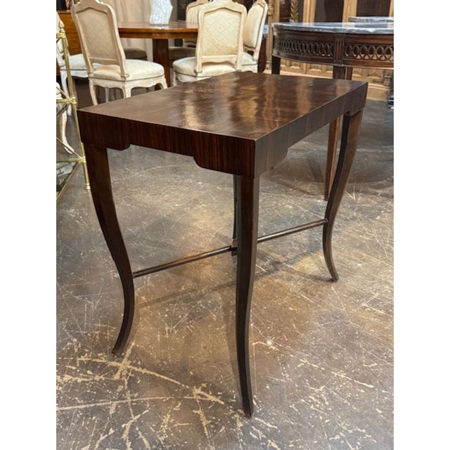 The Mid-Century Karl Springer Mahogany and Macassar Wood Side Table is a stylish and timeless piece of furniture that...