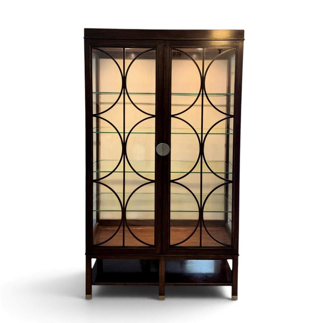A stunning Hickory White Skyloft Display Cabinet, beautifully crafted from maple solids and walnut veneers in a rich, warm...