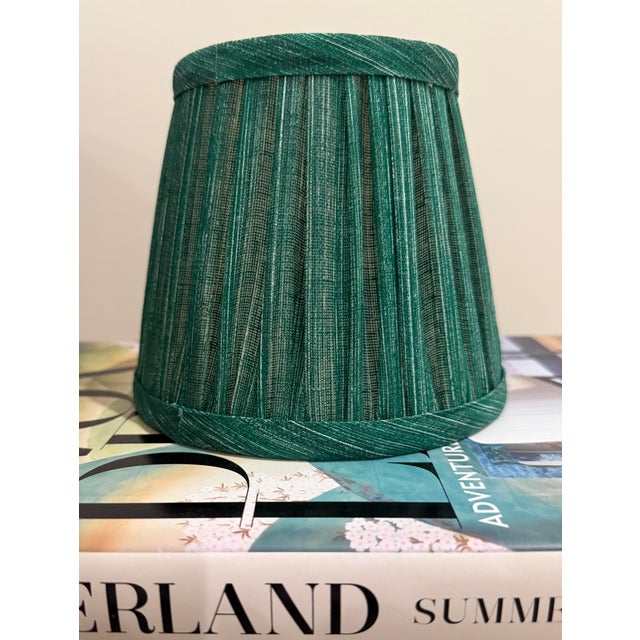 Two clip on lampshades made from Fermoie's "Aventurine" fabric. Handcrafted in England, these Aventurine lampshades were...