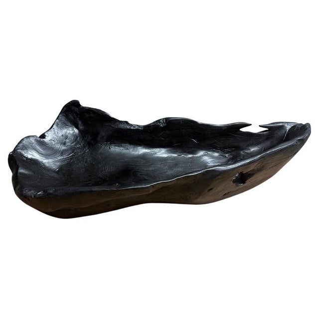 Impressive long charred vessel hand carved from a single piece of reclaimed teak. Both usable and sculptural. Charred...