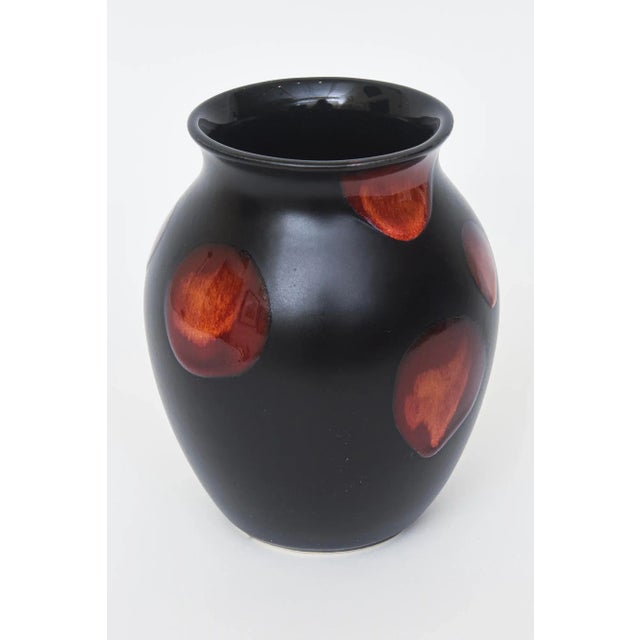 Poole Pottery Vintage English Ceramic vase with black background and abstract red orange blobs. Marked with a dolphin...