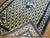 Vintage Chinese animal dragon rug in excellent medium even pile condition on creamy yellow colored ground. Measures: 5' x 8'.